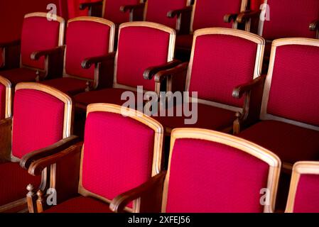red empty seats for spectators in the theater or cinema. High quality photo Stock Photo