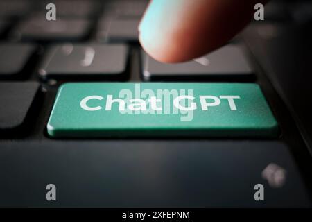ChatGPT on the keyboard button for Chat with AI or Artificial Intelligence. smart AI or artificial intelligence using an artificial intelligence chatb Stock Photo