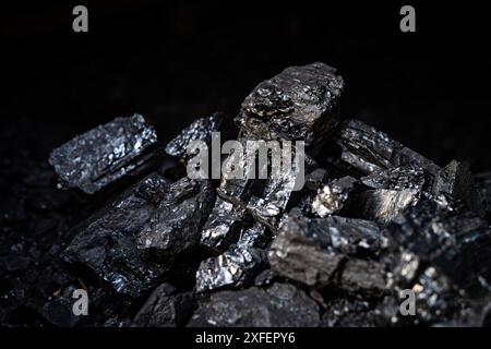 black charcoal black texture charcoal sack charcoal charcoal in the coal stove. black coal for heating. Stock Photo