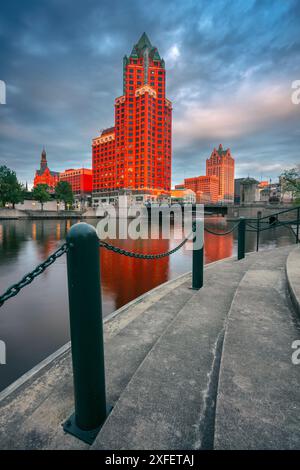 Milwaukee, Wisconsin, USA. Cityscape image of downtown Milwaukee, Wisconsin, USA with reflection of the skyline in Milwaukee River at summer sunset. Stock Photo