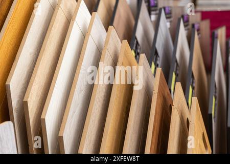 Laminate background. Samples of laminate or parquet with a pattern and wood texture for flooring and interior design. Production of wooden floors Stock Photo