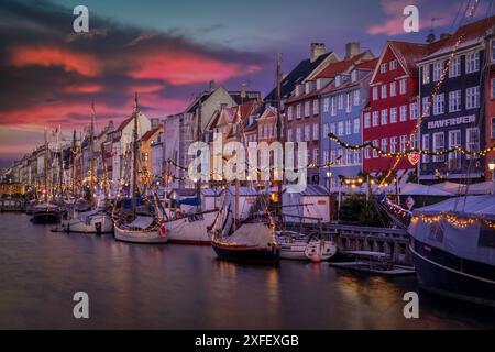 Nyhavn Canal at sunrise, Christmas time, Copenhagen, Denmark Stock Photo