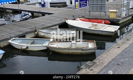 Lymington Harbour, England. 18 June 2024. Several small boats and rafts moored in the harbour. Stock Photo