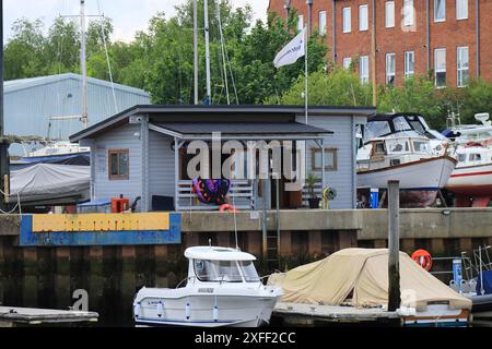 Lymington Harbour, England. 18 June 2024. The timber built marina office beside Haven Quay. Stock Photo