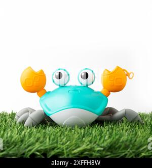 Toy light blue crab on a white background, isolated image. Stock Photo