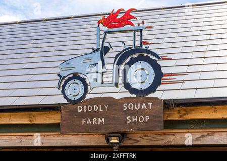 A representation of Jeremy Clarkson's Lamborghini tractor over his Diddly Squat Farm Shop (opened in 2020) near Chadlington, Chipping Norton, Oxfordsh Stock Photo