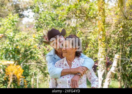 Lifestyle: Elderly husband and wife. husband embraces wife Stock Photo