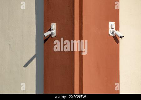 Camera hanging on the wall for video surveillance Stock Photo