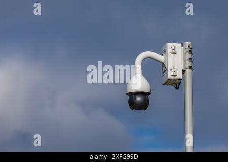 Camera hanging on the wall for video surveillance Stock Photo