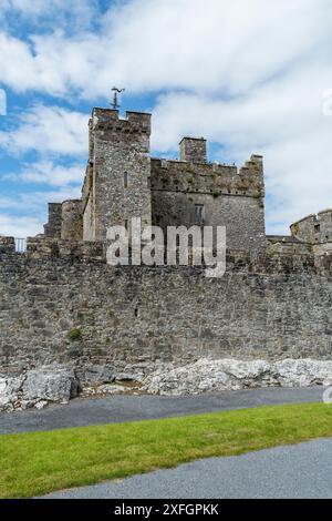 Cahir castle sits on a small rocky island in the middle of the River Suir. The name derives from the Irish word cathair - a stone fort. Stock Photo