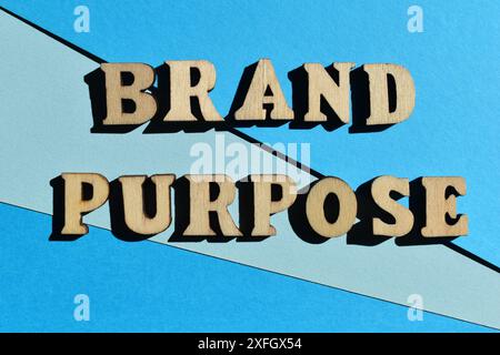 Brand Purpose, words in wooden alphabet letters isolated on blue background Stock Photo