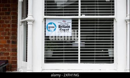 Reform poster in supporters house close to Conservative office in Bellingham Lane, Rayleigh Stock Photo
