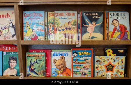 Dudley, west midlands united kingdom 15 November 2021 Color comics adverts on a table. Stack of old vintage comic books background. Stock Photo