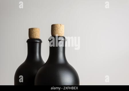 Pair of Bottles on plain background Stock Photo
