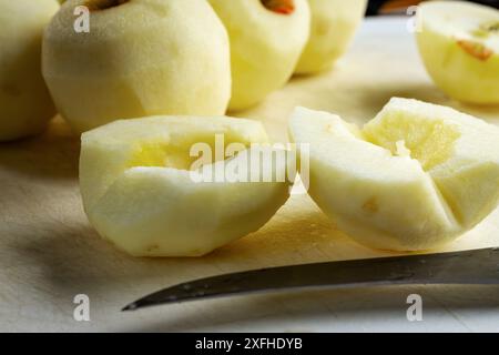 Gala apple cut in half with the core and seeds removed.  Preparation for a pie. Stock Photo