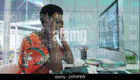 Image of trading board, tired african american woman removing spectacles and touching head Stock Photo