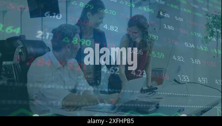 Image of multicolored trading board over caucasian coworkers discussing on desk Stock Photo
