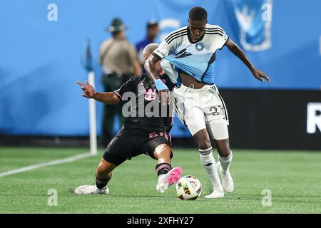 Charlotte, North Carolina, USA. 3rd July, 2024. Charlotte FC midfielder DJIBRIL DIANI (28) competes for the ball against Inter Miami defender MARCELO WEIGANDT (57) during the second half of the Charlotte FC vs Inter Miami CF MLS match at Bank of America Stadium in Charlotte, NC on July 3, 2024. (Credit Image: © Cory Knowlton/ZUMA Press Wire) EDITORIAL USAGE ONLY! Not for Commercial USAGE! Stock Photo