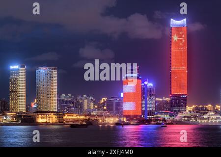 Shanghai, China - October 4, 2017: Amazing night view of the White Magnolia Plaza and Shanghai Port International Cruise Terminal at North Bund. Stock Photo