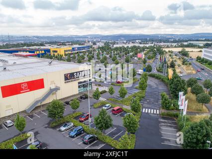 Koblenz, Germany, 11.07.2019 Aerial view Parking lot of Saturn and IKEA store against cloudy sky in Germany, Stock Photo