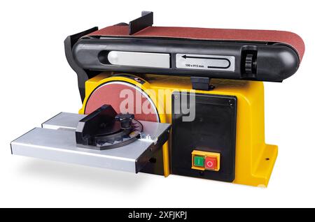 yellow stationary disc and belt electric power sander machine isolated on white background. industry construction diy and hobby equipment concept Stock Photo