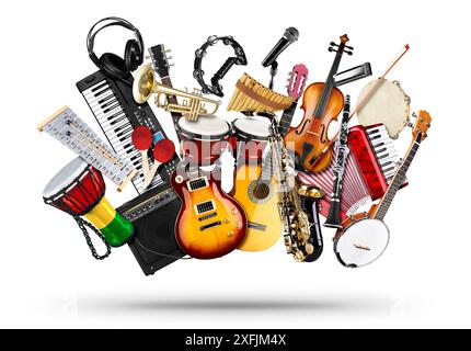 stack pile collage of various musical instruments. Electric guitar violin piano keyboard bongo drums tamburin saxophone, and trumpet. Brass percussion Stock Photo