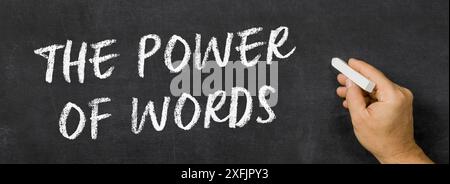 Text written on a blackboard -  The power of words Stock Photo