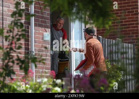 Barnsley North Labour candidate team canvassing in the Barnsley area during the 2024 United Kingdom elections in the Barnsley area, Barnsley, United Kingdom, 4th July 2024  (Address and documents pixilated)  (Photo by Alfie Cosgrove/News Images) Stock Photo