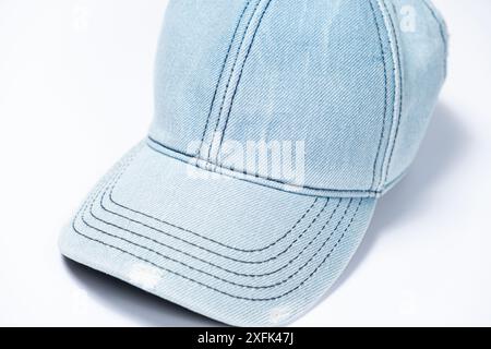 Blue denim cap close-up on white background Stock Photo