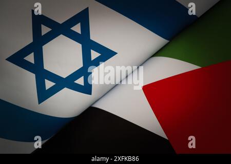 Flags of Israel and Palestine painted on cracked wall background. Concept of the Conflict between Israel and Palestinian Authorities. Stock Photo