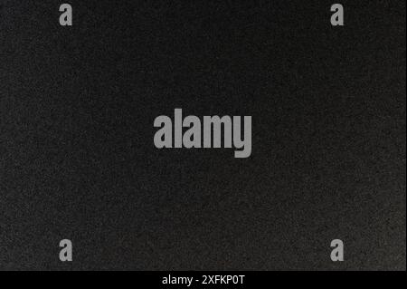 Grainy black mat pattern of flat plastic close up view Stock Photo
