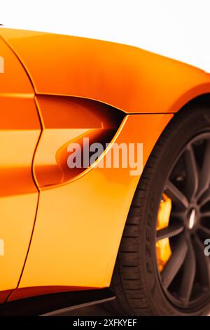 Aston Martin Vantage front fender air outlet, close up view, car in studio - High Resolution Image Stock Photo