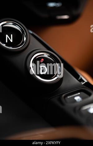 Aston Martin Vantage gear selector closeup, Luxury sportscar interior detail, High Resolution Stock Photo