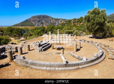 The temple terrace and the round structure ruins at the Kaunos ancient city. Kaunos is located near Dalyan town in Mugla Province, Turkey. Stock Photo