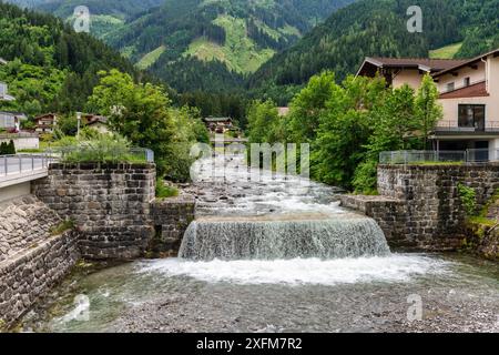 The Ziller river running through the village of Mayrhofen in Austria, Europe Stock Photo