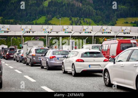 Brenner highway, Italy - 1 July 2024: Return journey traffic jam on the Brenner highway in Italy to the border with Austria at the toll station *** Rückreise Stau auf der Brennerautobahn in Italien zur Grenze an Österreich an der Mautstation Stock Photo