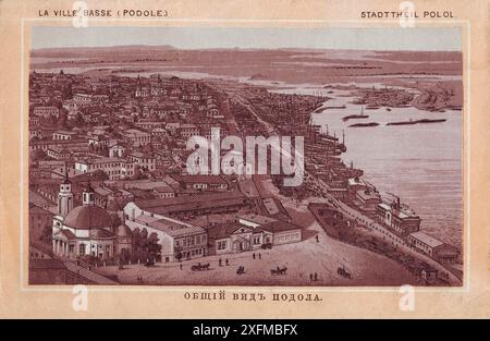 Vintage view of Podil (also known as Podol) is from Souvenir of Kiev, an early 20th-century album showing the main sites of Kiev, the capital of Ukraine and at that time one of the most important cities of the Russian Empire. The name Podil derives from an old Slavic word meaning 'lowlands.' Established before the city expanded into the surrounding hills, Podil stretches along the Dnieper River. It was where Kiev's trade, commerce, and industry originated and where craftsmen, merchants, and fishermen sold their wares. This image shows the area with its factories, churches, and homes and the bu Stock Photo