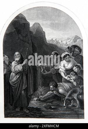 Moses Striking the Rock twice and Water began to flow from The Imperial Illustrated Bible 19th Century Stock Photo