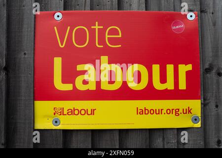 Slough, Berkshire, UK. 4th July, 2024. Vote Labour signs outside a property in Slough, Berkshire today on General Election Day. Labour are predicted to hold their seat after voting today. Credit: Maureen McLean/Alamy Live News Stock Photo