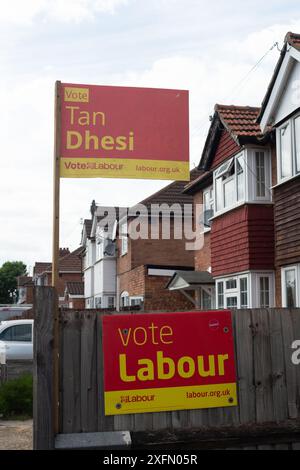 Slough, Berkshire, UK. 4th July, 2024. Vote Labour signs outside a property in Slough, Berkshire today on General Election Day. Labour are predicted to hold their seat after voting today. Credit: Maureen McLean/Alamy Live News Stock Photo