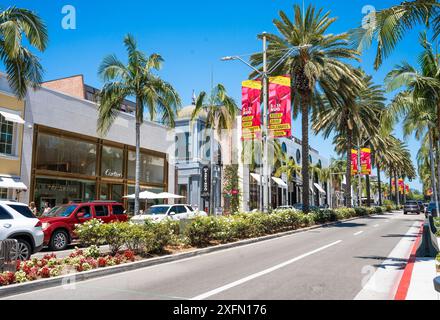 Street scene on Rodeo Drive in Beverly Hills California with people and stores. Stock Photo