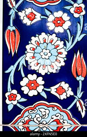 Colorful traditional Turkish ceramic tile pattern with floral motifs, texture, background. Stock Photo