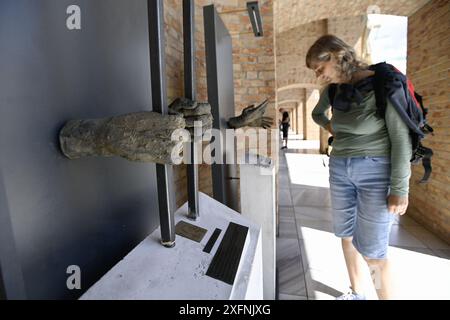 Visitors view the exhibition Let's Not Forget the Crimes of Communism in Velehrad, Czech Republic, where start the two-day Day of Good Will People on July 4, 2024. The depiction of hands behind bars points to 33 priests who were innocently convicted and imprisoned by the communist regime. The aim of the exhibition is to recall the events surrounding the publication of the Pastoral Letter in 1949. This year marks the 75th anniversary of the publication of the pastoral letter 'The Voice of the Czechoslovak Bishops and Ordinaries to the Faithful in the Hour of Great Trial', which was adopted by t Stock Photo