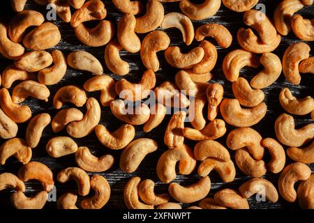 cashew nuts pattern texture on wood background top view Stock Photo