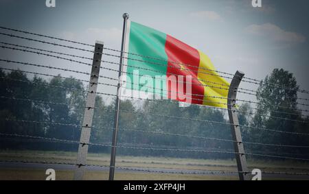 Barbed wire fence and flag of Cameroon - border concept - 3d illustration Stock Photo