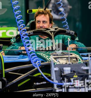 NORTHAMPTONSHIRE, UNITED KINGDOM. 04th Jul, 24. Fernando Alonso (Spain) of Aston Martin Aramco F1 Team test his car on Thursday after the Formula 1 Pit Lane Walk during Qatar Airways British Grand Prix 2024 at Silverstone Circuit on Thursday, July 04, 2024 in NORTHAMPTONSHIRE, ENGLAND. Credit: Taka G Wu/Alamy Live News Stock Photo