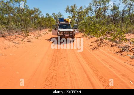 Four wheel drive car on a red sand road from Broome to Cape Leveque Kimberley, Western Australia. July 2016. Stock Photo