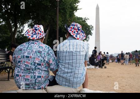 Washington, United States. 04th July, 2024. Groups gather near the Washington Monument on the National Mall before celebrations of America's 248th Independence Day in Washington, DC, on Thursday, July 4, 2024. Photo by Ken Cedeno/UPI Credit: UPI/Alamy Live News Stock Photo