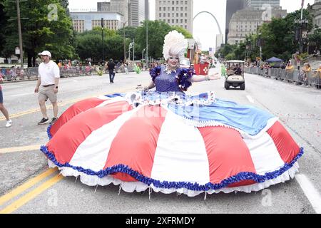 St. Louis, United States. 04th July, 2024. A woman in an oversized dress walks in the America's Birthday Parade in St. Louis on Thursday, July 4, 2024. Photo by Bill Greenblatt/UPI Credit: UPI/Alamy Live News Stock Photo