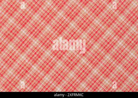 Red with white color texture of checkered fabric as background. Stock Photo